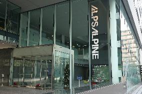 Alps Alpine signboard and logo